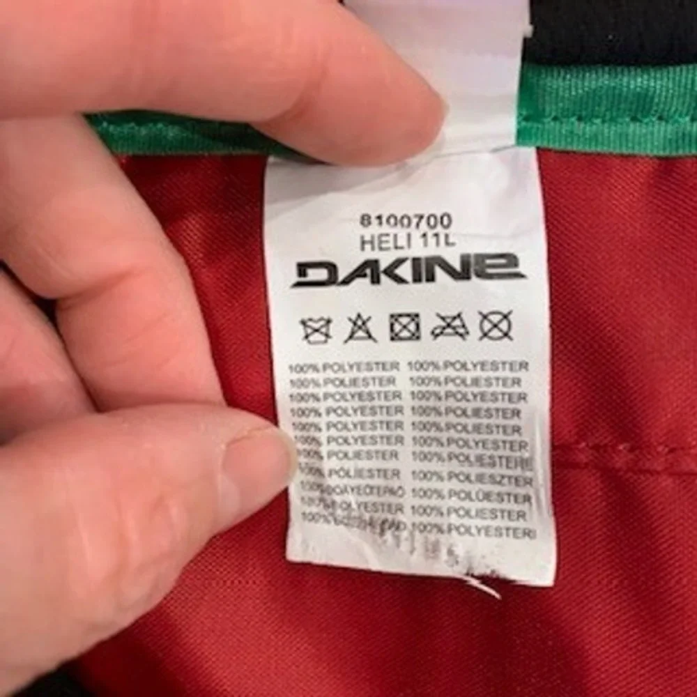 Dakine Heli Pack 11L Backpack Black Rasta Snowboard Ski Carry Daypack 8100700